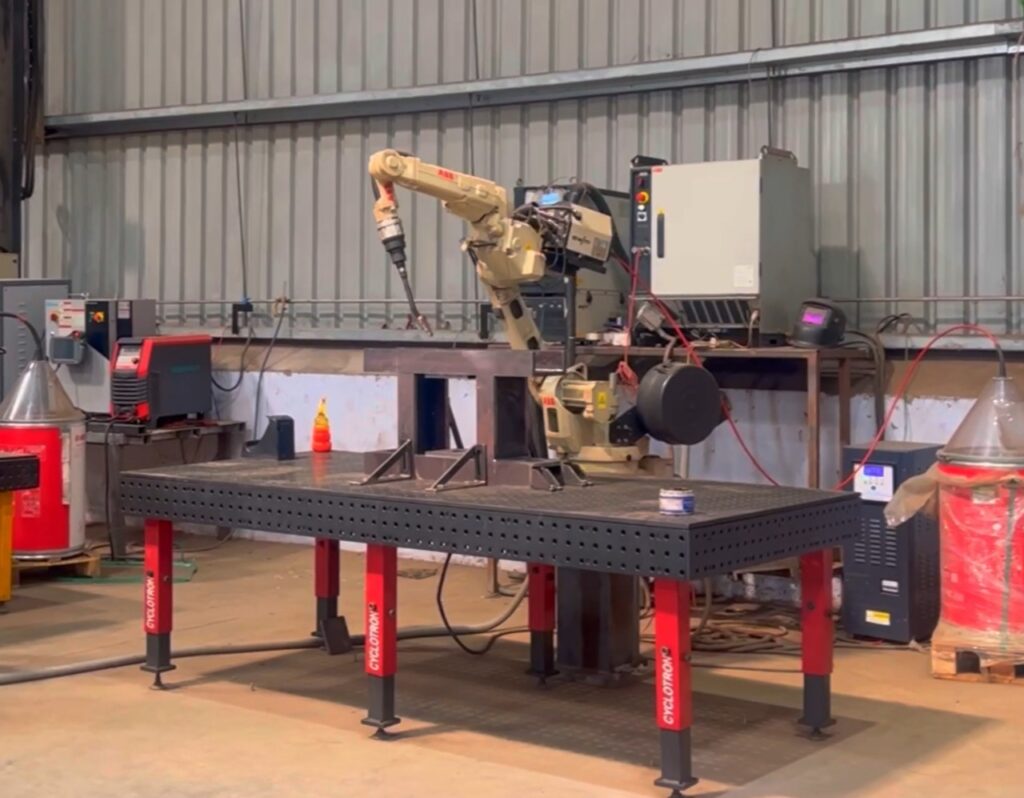 Robotic welding on cyclotron table